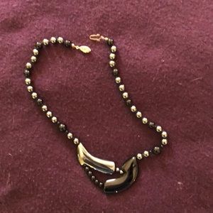 Modern motif hematite bead necklace